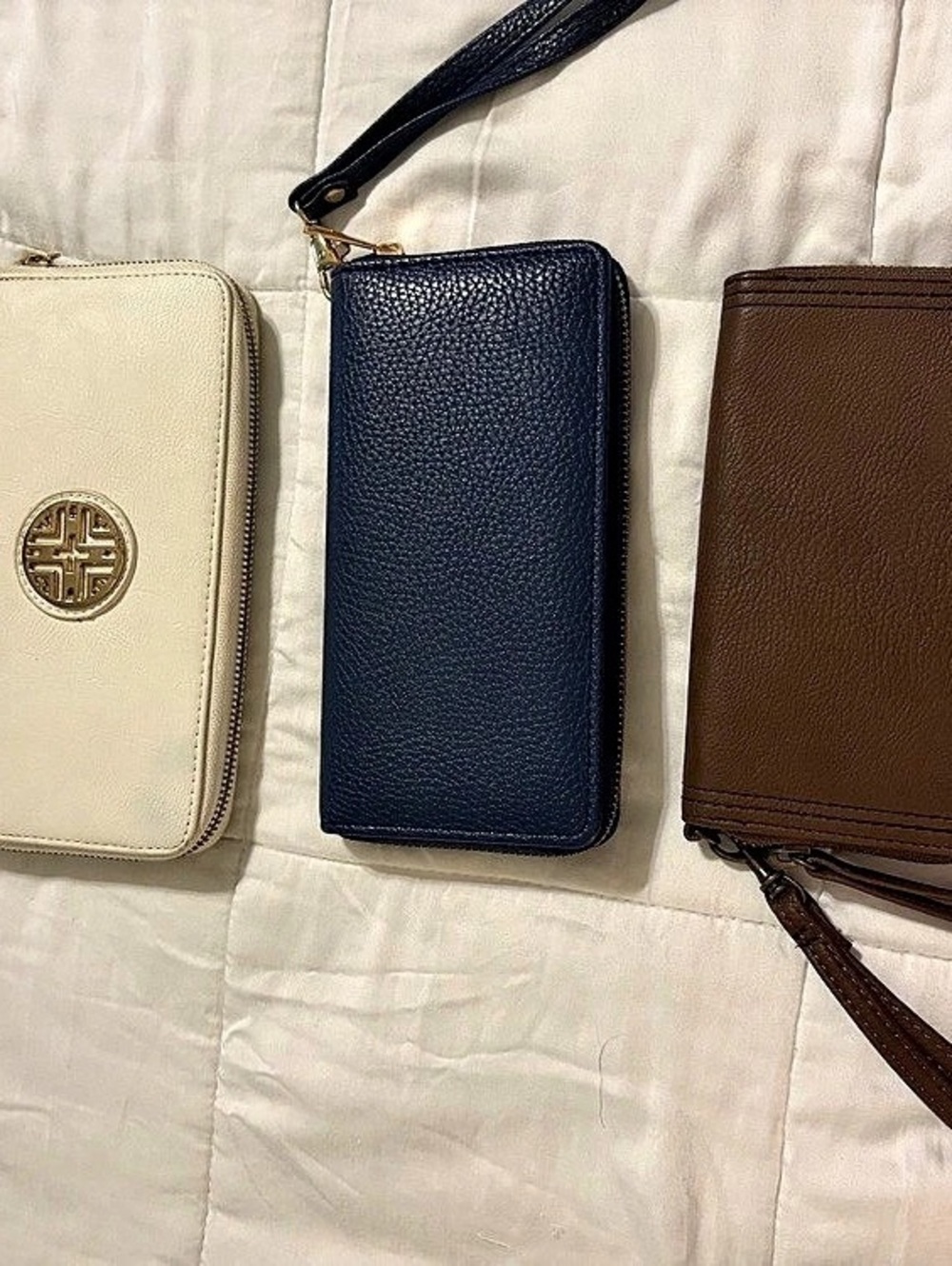 Set of 3 wallets. Tory Burch Zip-Around Wristlet Wallet in Ivory, others in brow